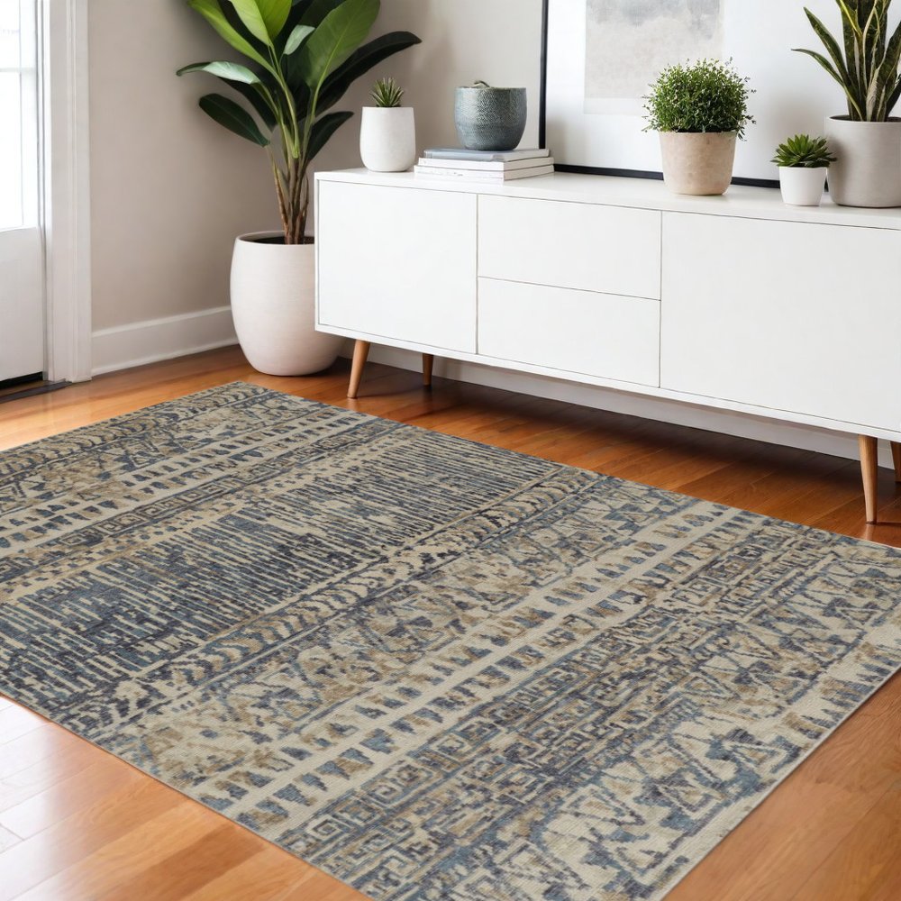 6' X 9' Tan Ivory And Blue Wool Geometric Hand Knotted Area Rug