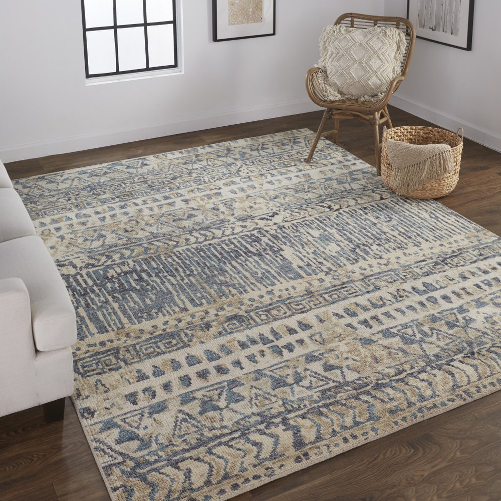 6' X 9' Tan Ivory And Blue Wool Geometric Hand Knotted Area Rug