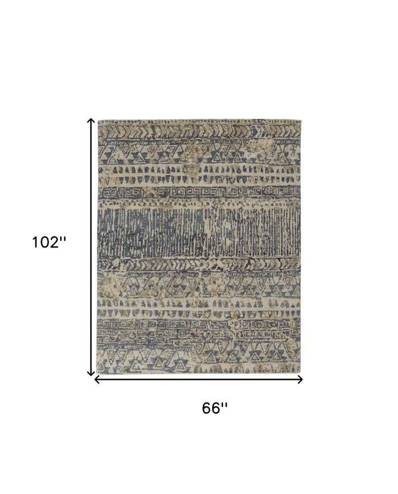 6' X 9' Tan Ivory And Blue Wool Geometric Hand Knotted Area Rug