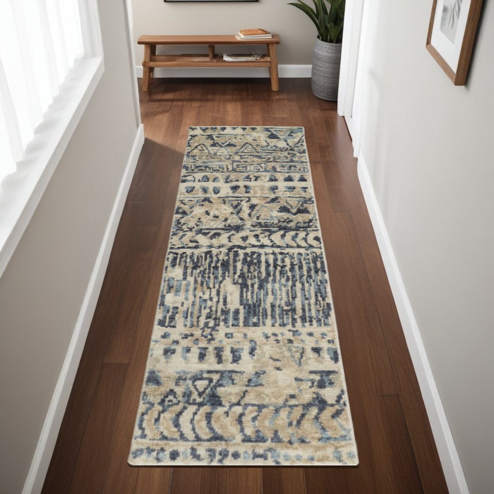 6' X 9' Tan Ivory And Blue Wool Geometric Hand Knotted Area Rug