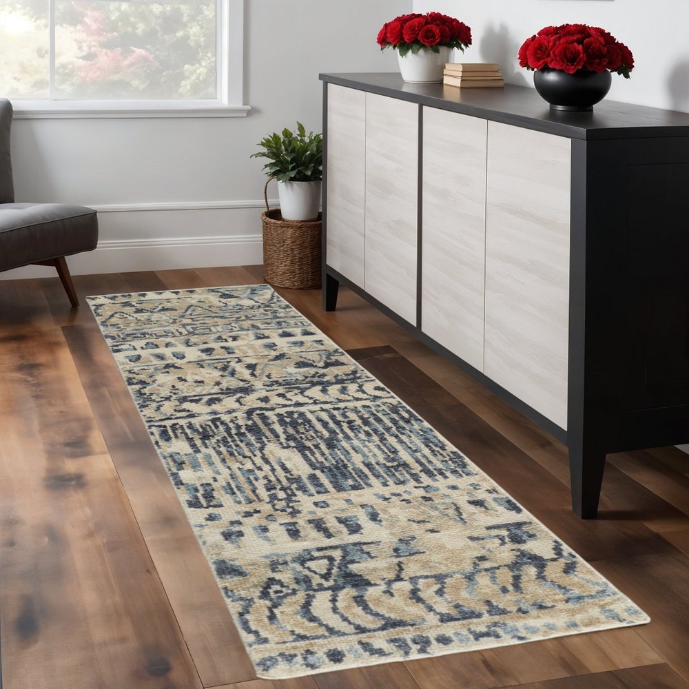 6' X 9' Tan Ivory And Blue Wool Geometric Hand Knotted Area Rug