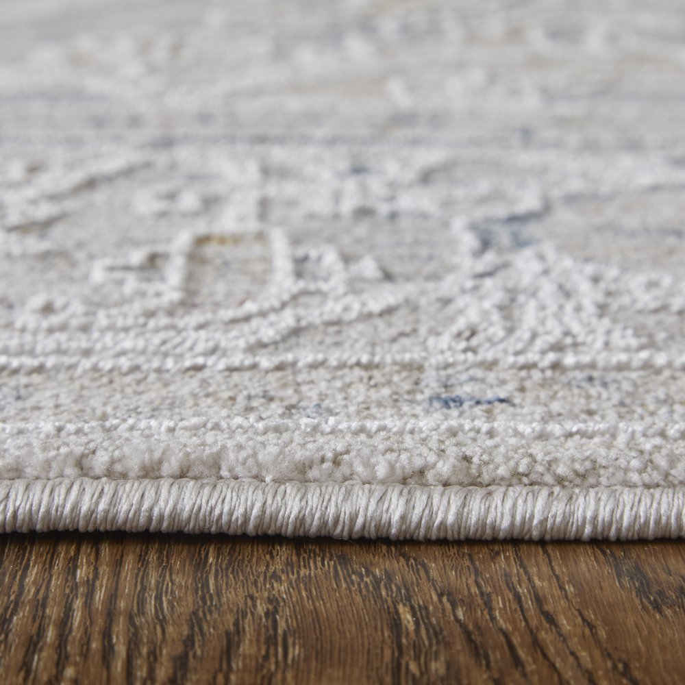 5' X 8' Ivory Taupe and Blue Oriental Power Loom Worn Faded Area Rug With Fringe