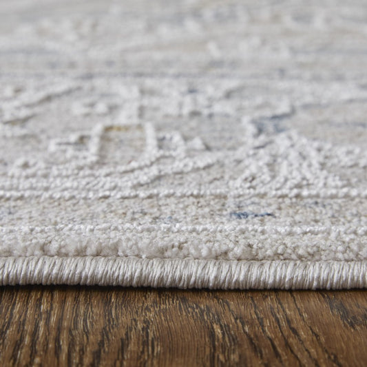 5' X 8' Ivory Taupe and Blue Oriental Power Loom Worn Faded Area Rug With Fringe