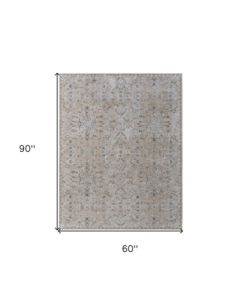 5' X 8' Ivory Taupe and Blue Abstract Power Loom Worn Faded Area Rug With Fringe