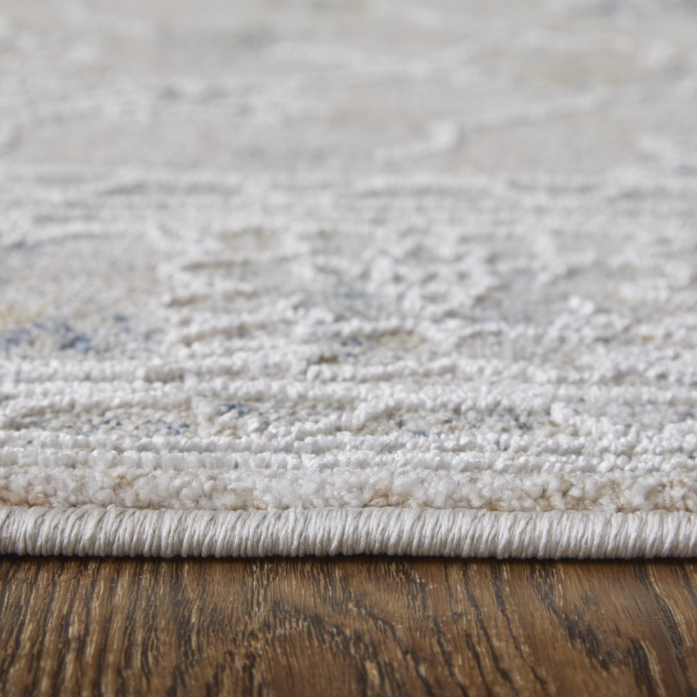8' X 10' Ivory Taupe and Blue Floral Power Loom Worn Faded Area Rug With Fringe