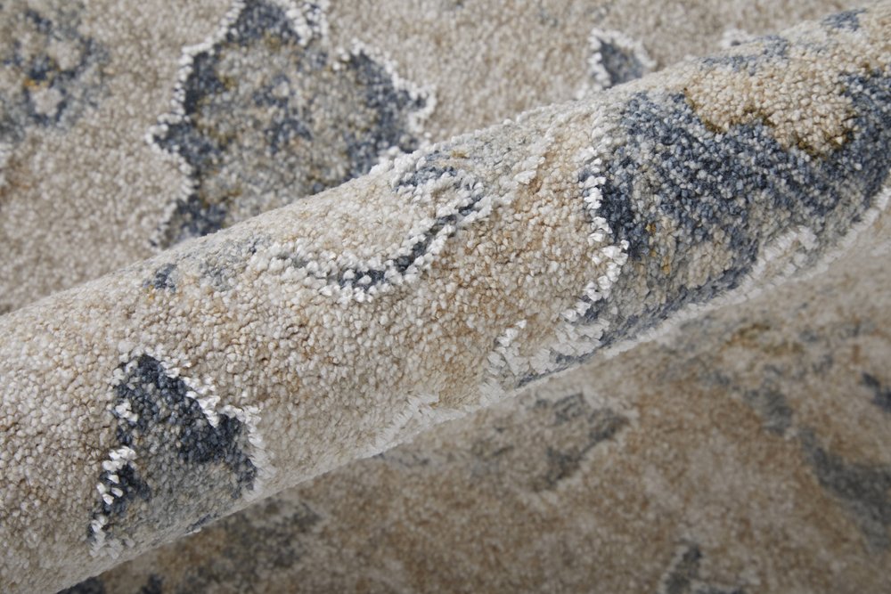 8' X 10' Ivory Taupe and Blue Floral Power Loom Worn Faded Area Rug With Fringe