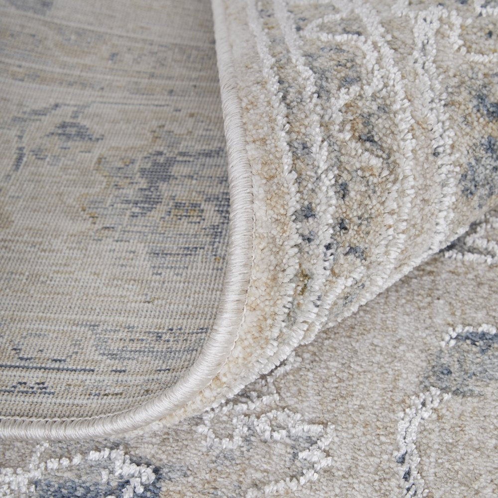 8' X 10' Ivory Taupe and Blue Floral Power Loom Worn Faded Area Rug With Fringe