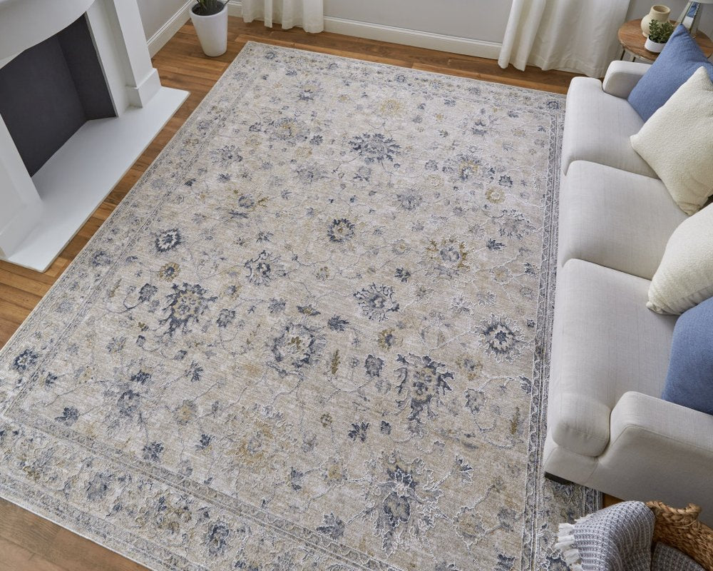 8' X 10' Ivory Taupe and Blue Floral Power Loom Worn Faded Area Rug With Fringe