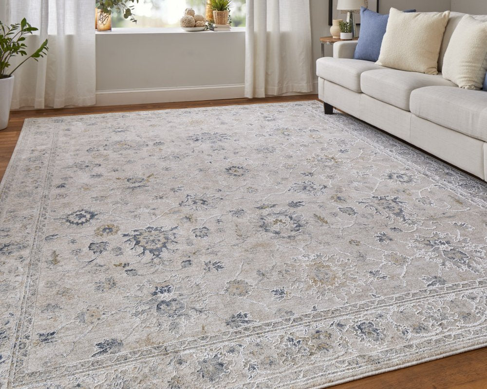 8' X 10' Ivory Taupe and Blue Floral Power Loom Worn Faded Area Rug With Fringe