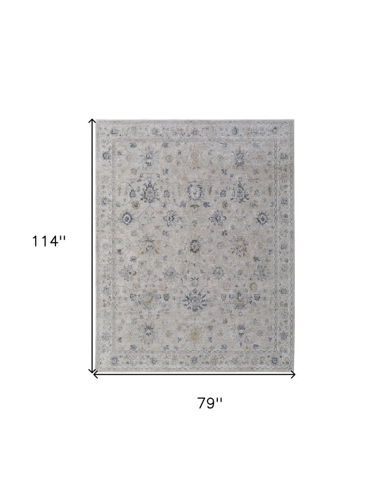 8' X 10' Ivory Taupe and Blue Floral Power Loom Worn Faded Area Rug With Fringe