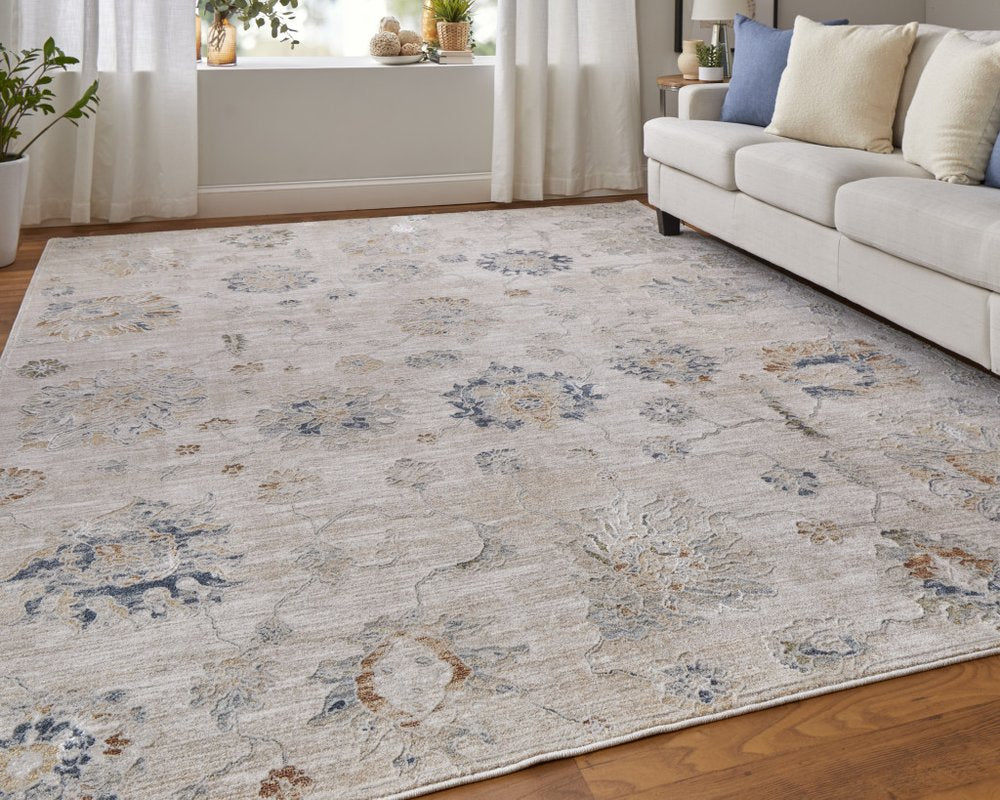 5' X 8' Ivory Taupe and Blue Floral Power Loom Worn Faded Area Rug With Fringe