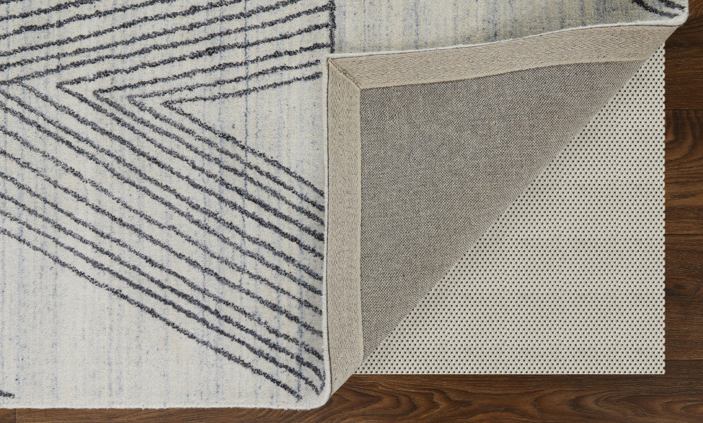 4' X 6' Black and Ivory Abstract Hand Woven Area Rug