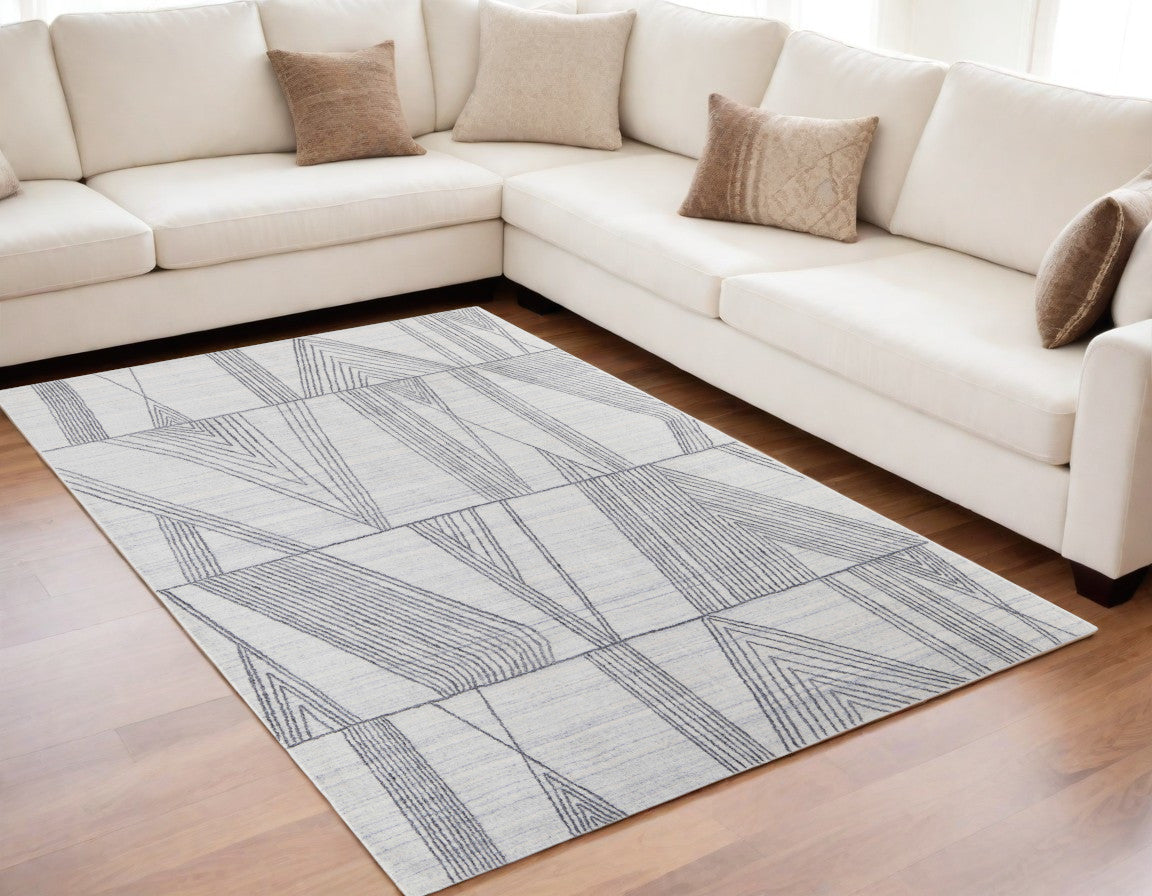 4' X 6' Black and Ivory Abstract Hand Woven Area Rug
