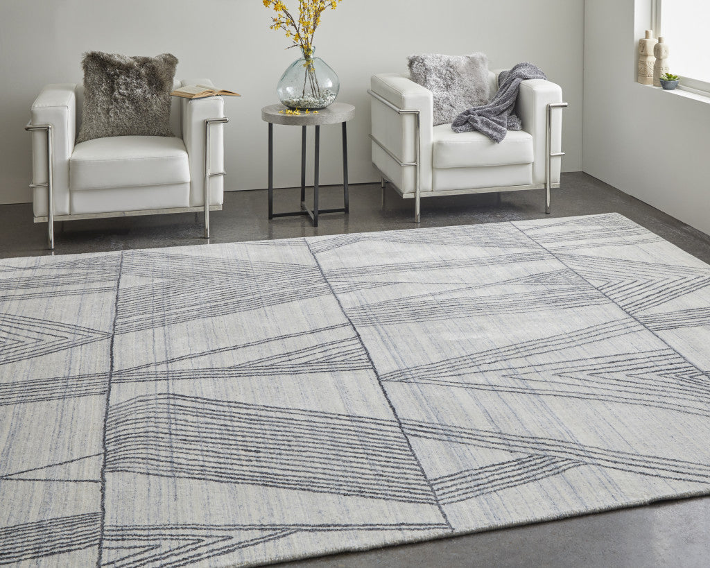 4' X 6' Black and Ivory Abstract Hand Woven Area Rug