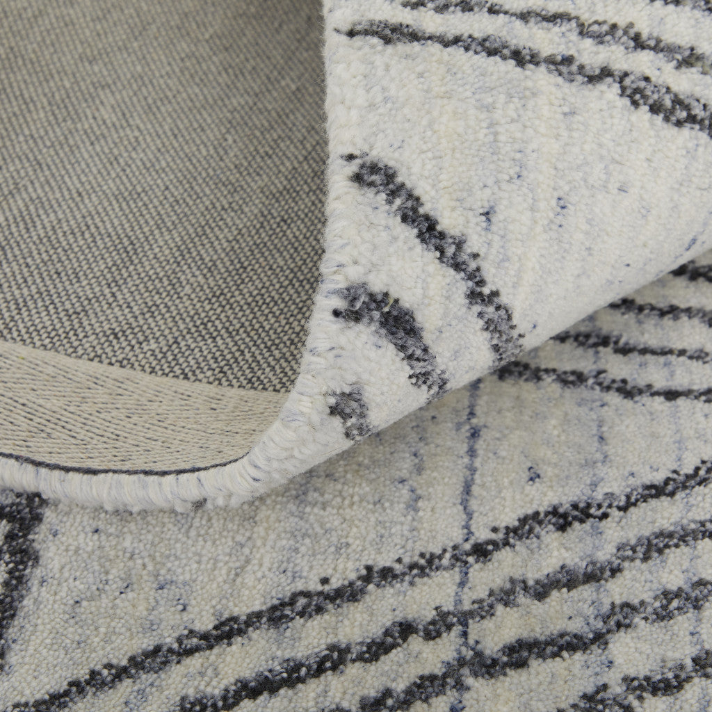 4' X 6' Black and Ivory Abstract Hand Woven Area Rug