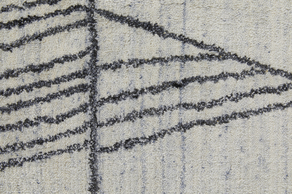 4' X 6' Black and Ivory Abstract Hand Woven Area Rug