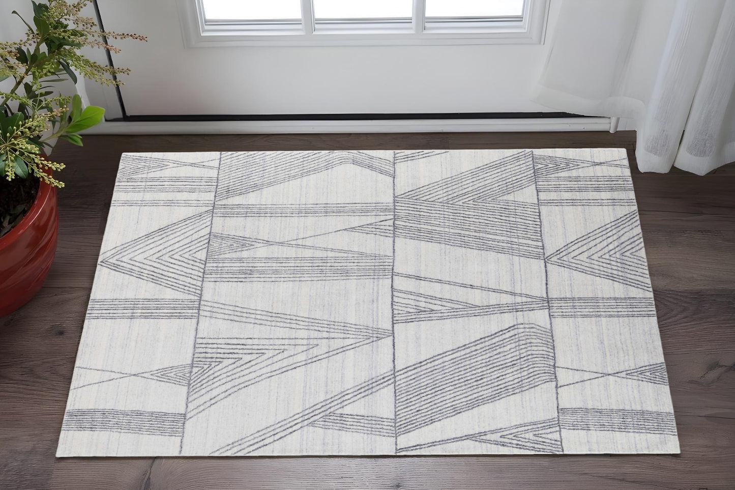 4' X 6' Black and Ivory Abstract Hand Woven Area Rug