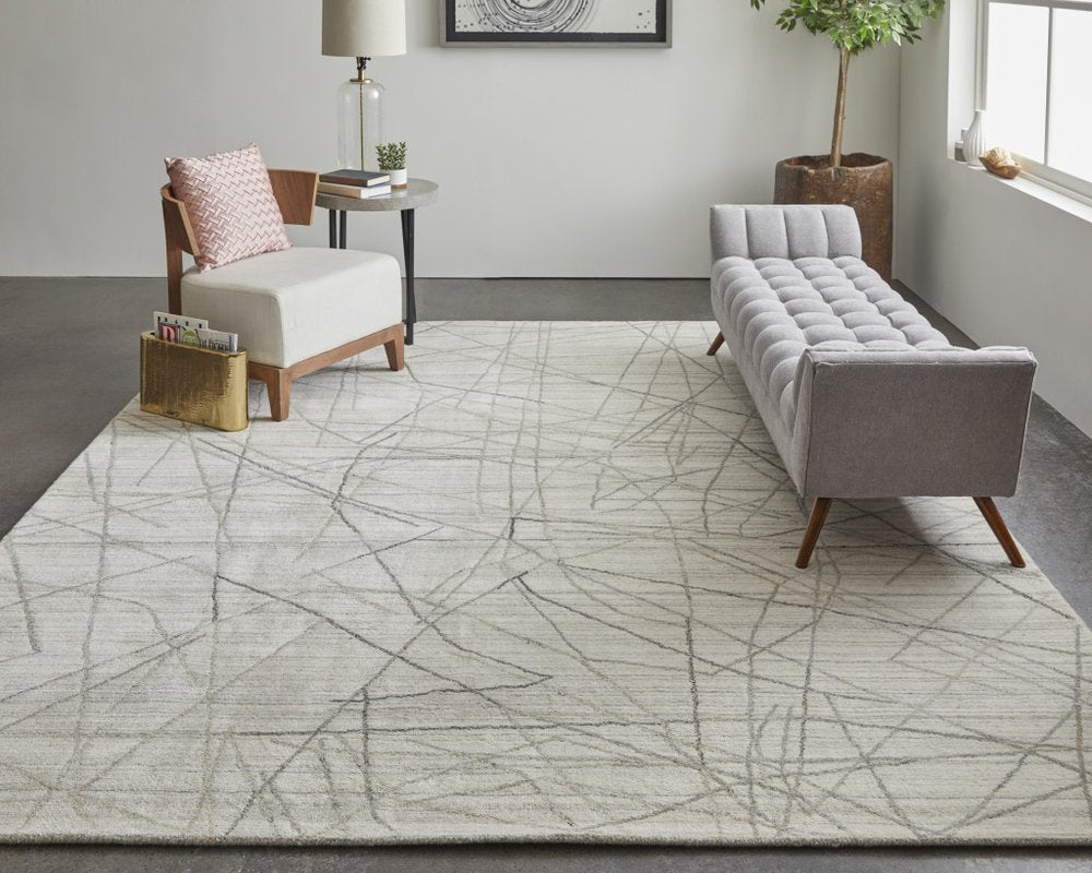 5' X 8' Gray and Ivory Abstract Hand Woven Area Rug