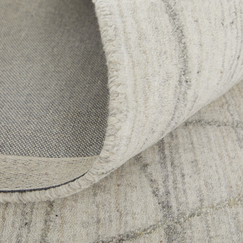 5' X 8' Gray and Ivory Abstract Hand Woven Area Rug