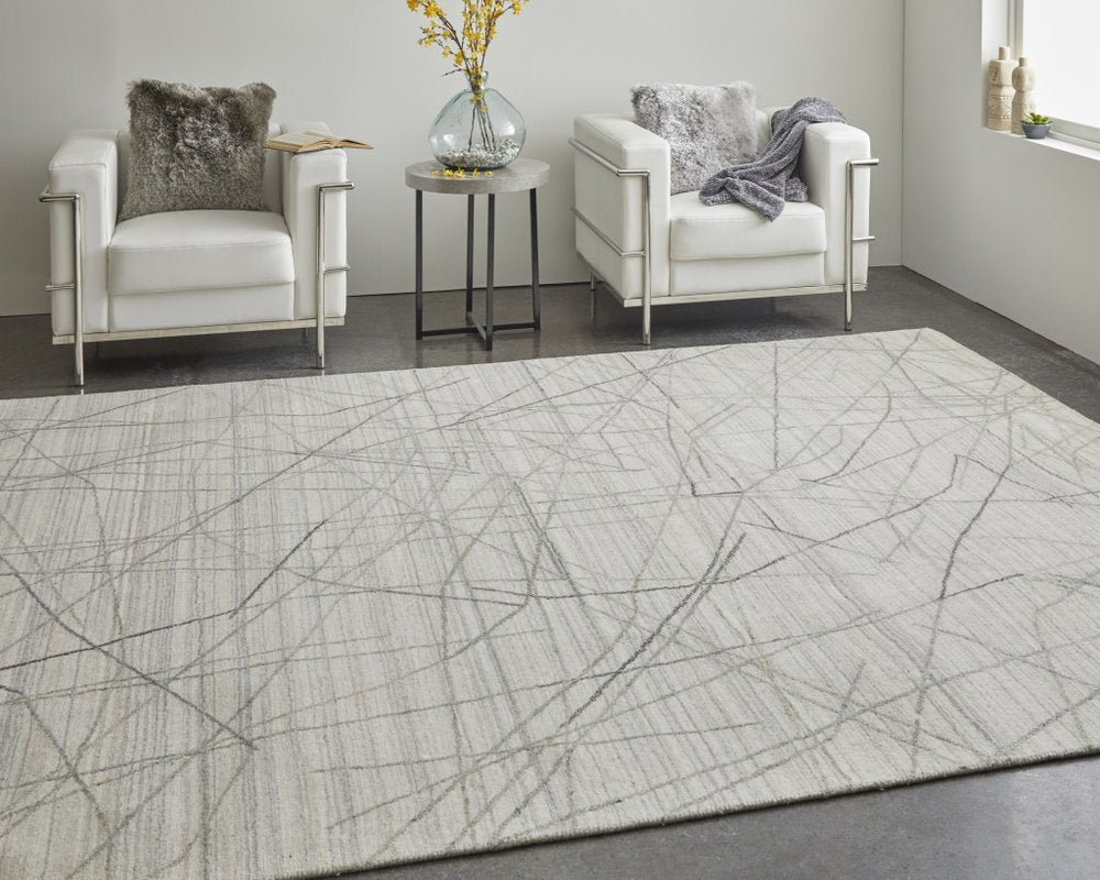 5' X 8' Gray and Ivory Abstract Hand Woven Area Rug