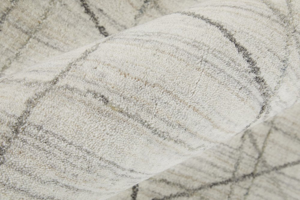 5' X 8' Gray and Ivory Abstract Hand Woven Area Rug