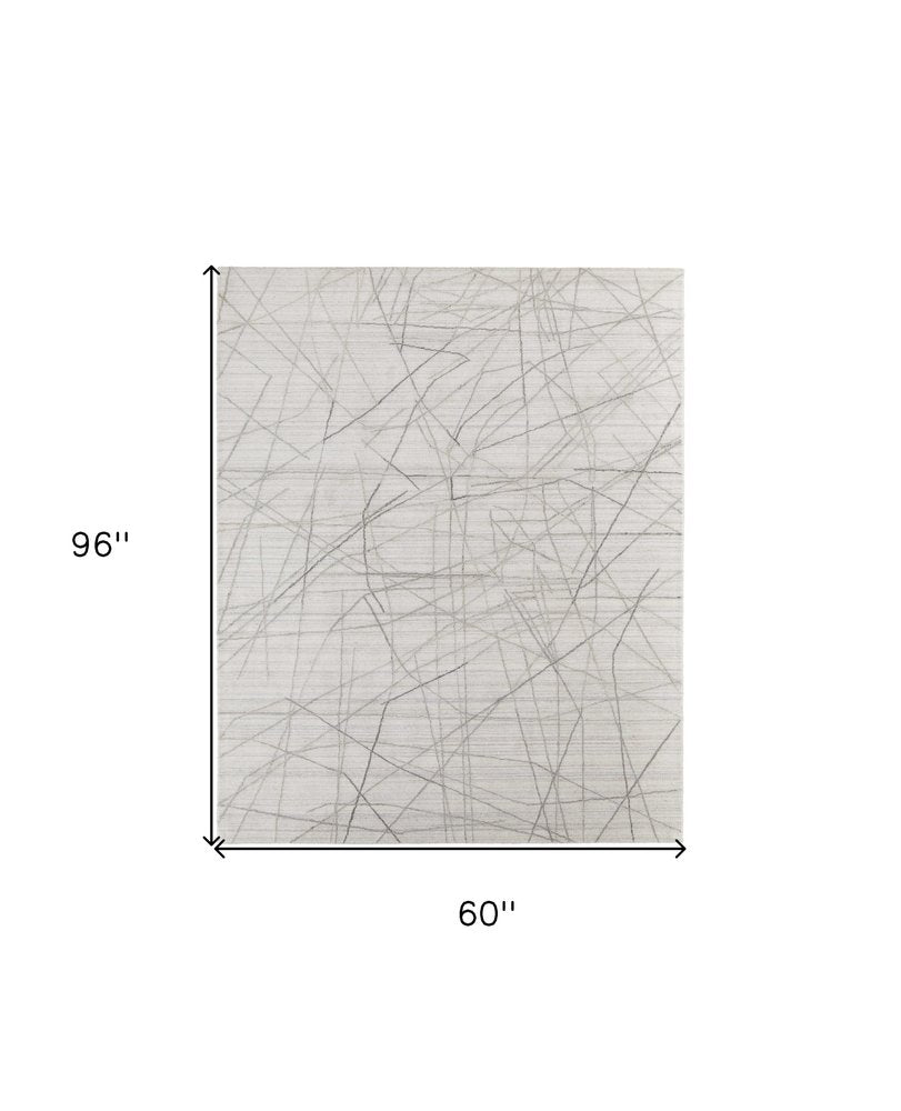 5' X 8' Gray and Ivory Abstract Hand Woven Area Rug