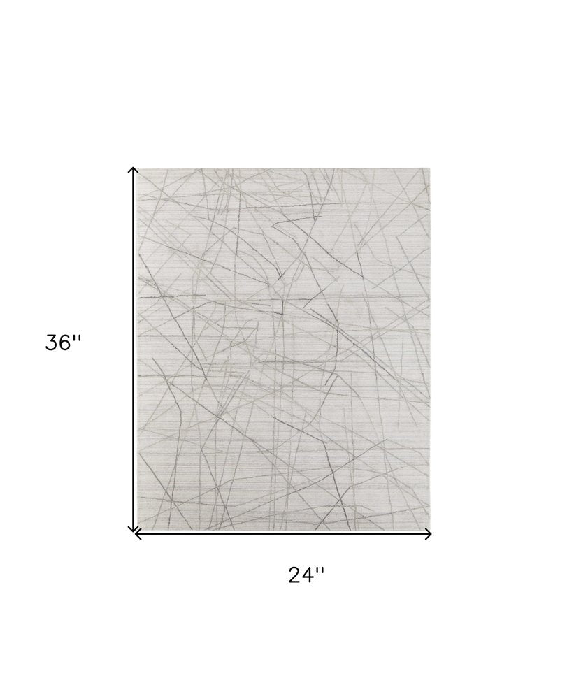 5' X 8' Gray and Ivory Abstract Hand Woven Area Rug