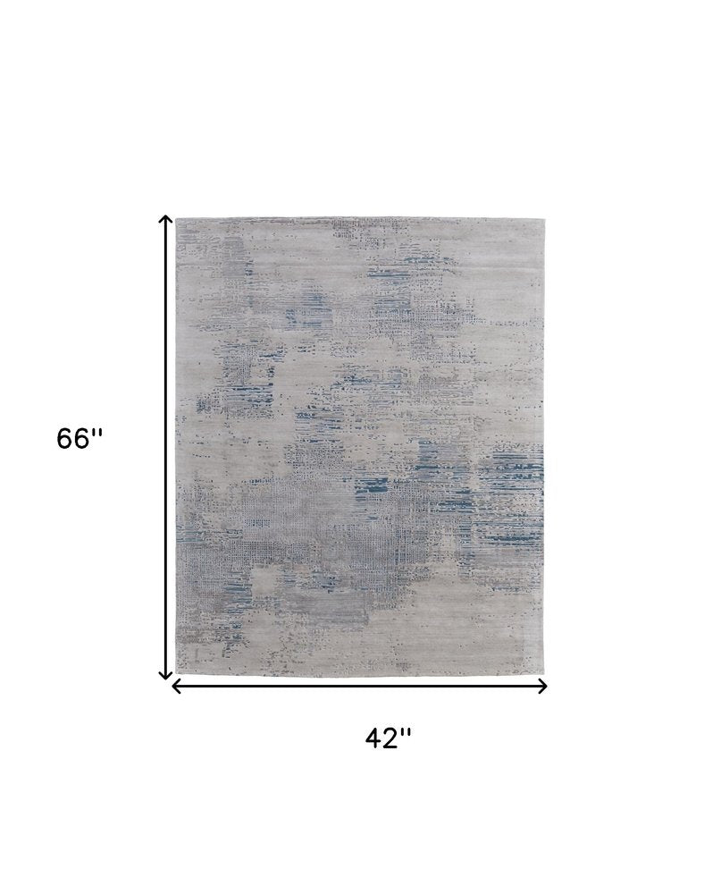 4' X 6' Gray Taupe and Blue Abstract Hand Tufted Area Rug