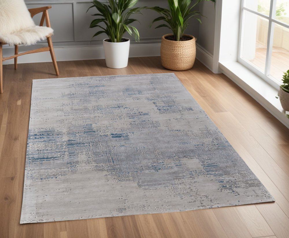 4' X 6' Gray Taupe and Blue Abstract Hand Tufted Area Rug