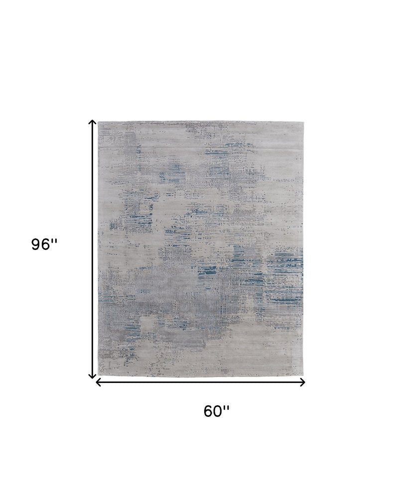 4' X 6' Gray Taupe and Blue Abstract Hand Tufted Area Rug
