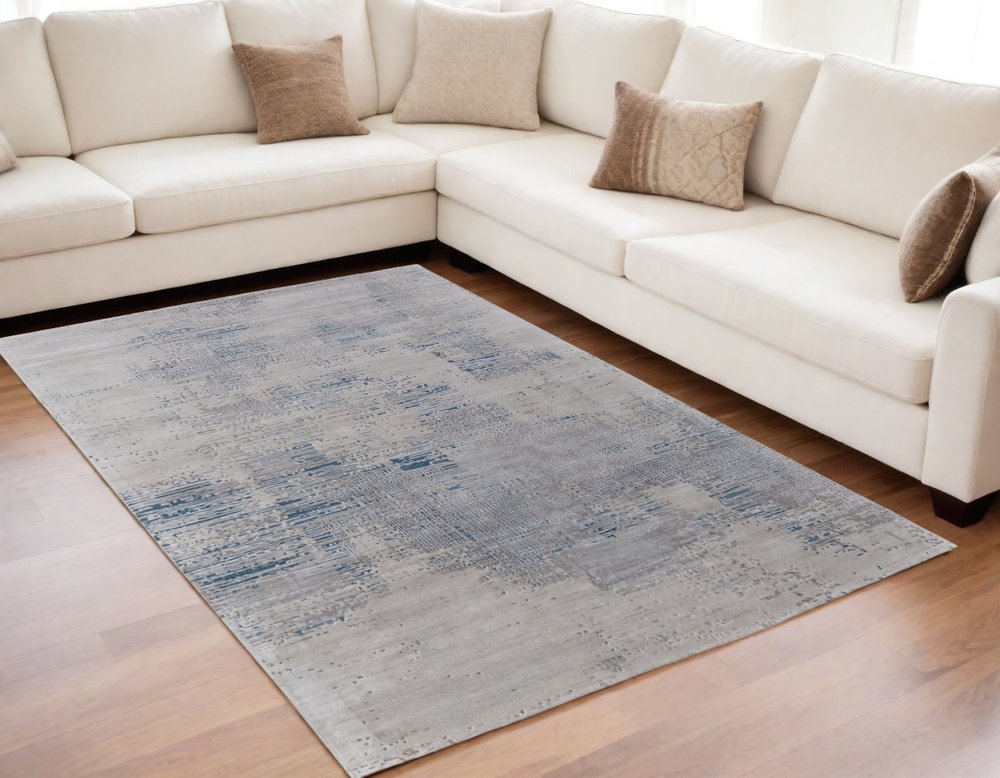 4' X 6' Gray Taupe and Blue Abstract Hand Tufted Area Rug