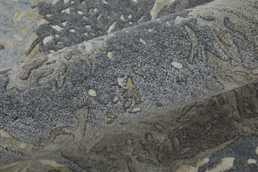 4' X 6' Ivory Taupe and Green Abstract Hand Tufted Worn Faded Area Rug