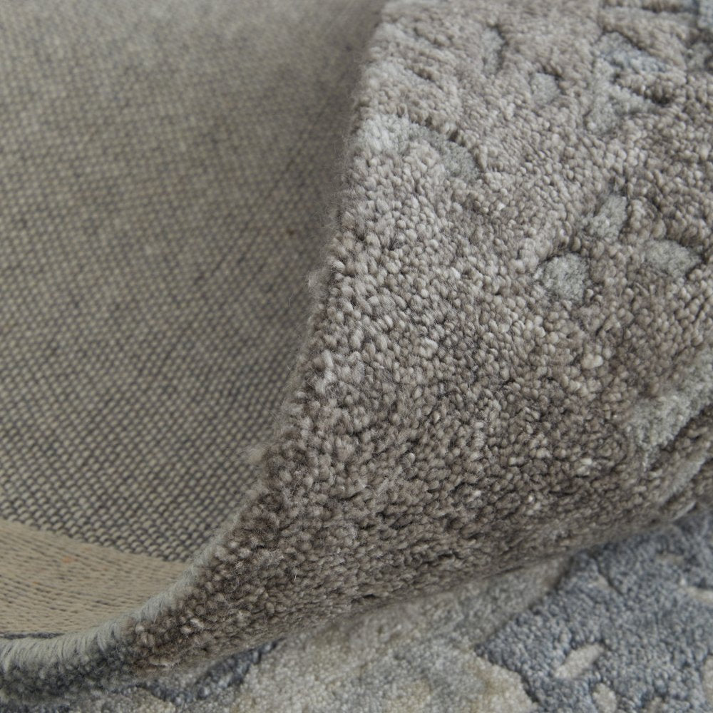 4' X 6' Ivory Taupe and Green Abstract Hand Tufted Worn Faded Area Rug