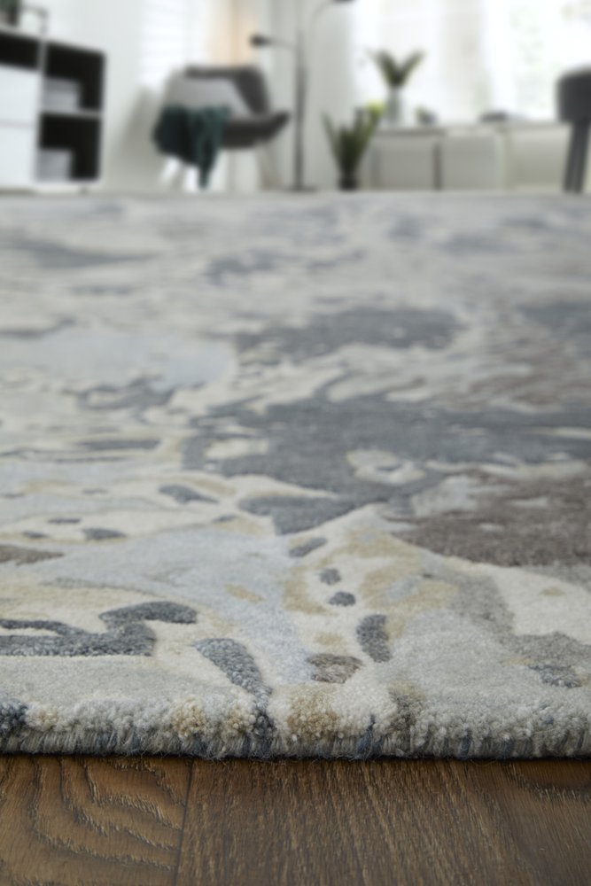 4' X 6' Ivory Taupe and Green Abstract Hand Tufted Worn Faded Area Rug