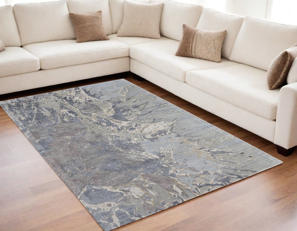 4' X 6' Ivory Taupe and Green Abstract Hand Tufted Worn Faded Area Rug