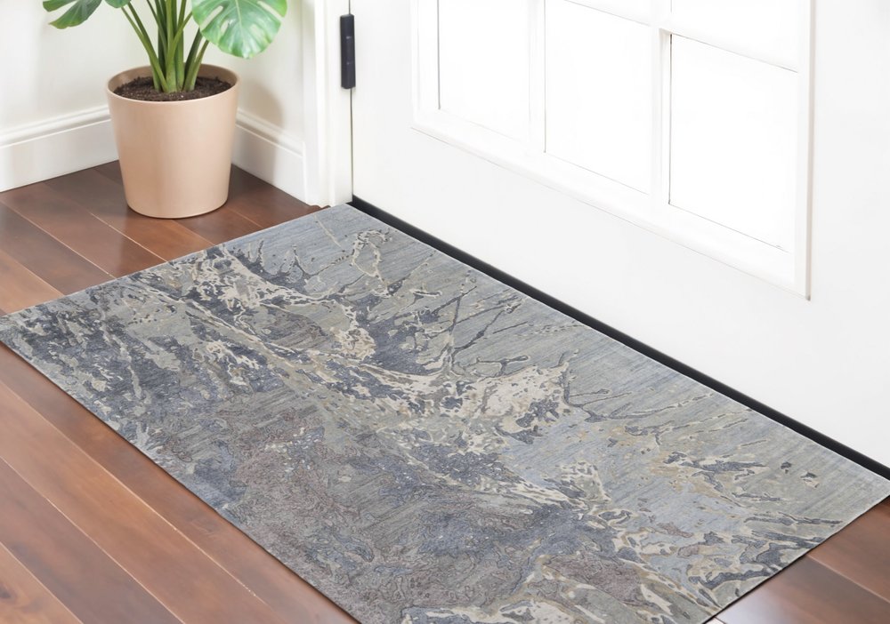 4' X 6' Ivory Taupe and Green Abstract Hand Tufted Worn Faded Area Rug