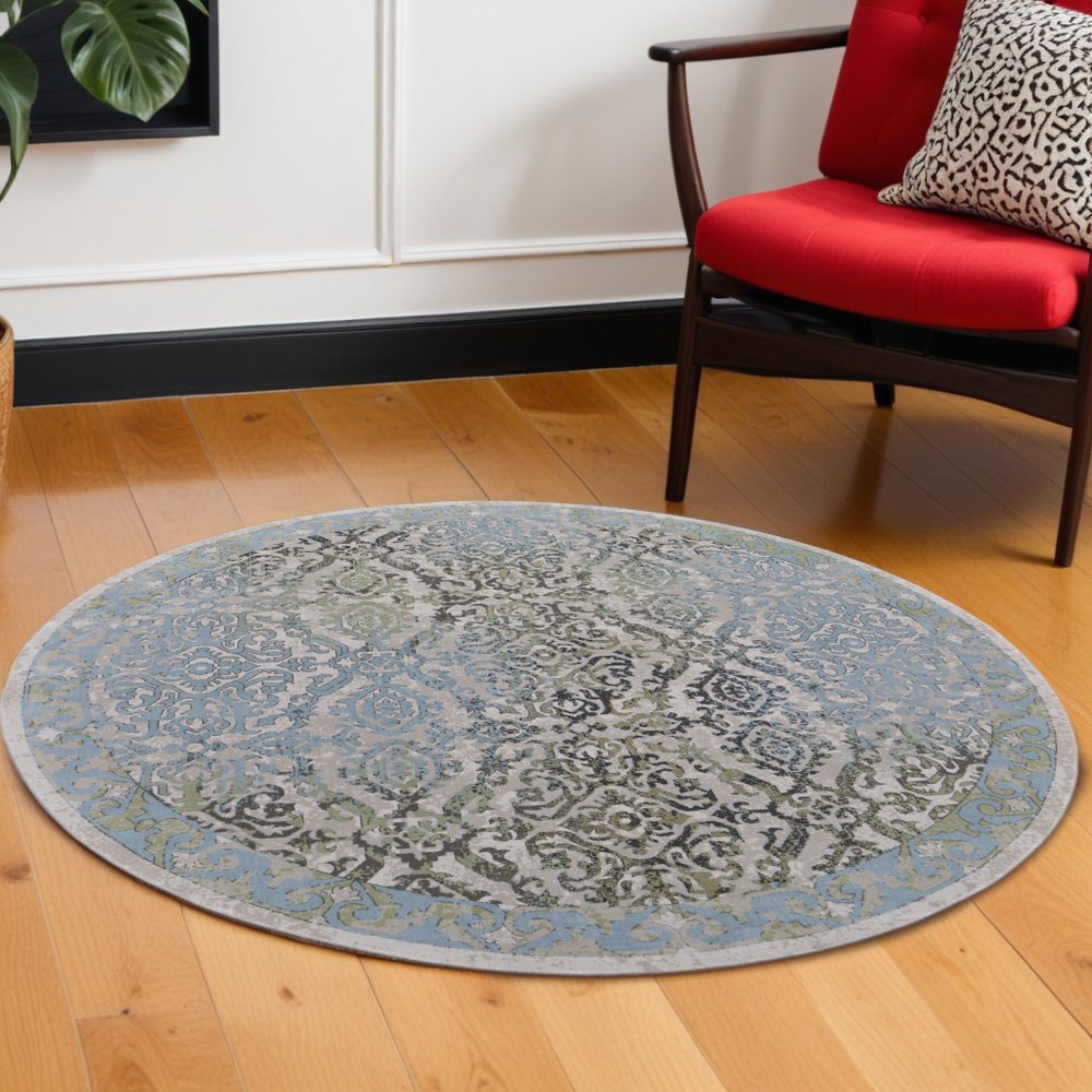 8' Blue Green and Gray Floral Power Loom Worn Faded Round Rug