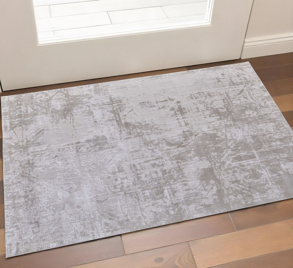 2' X 3' Taupe And Silver Abstract Distressed Area Rug