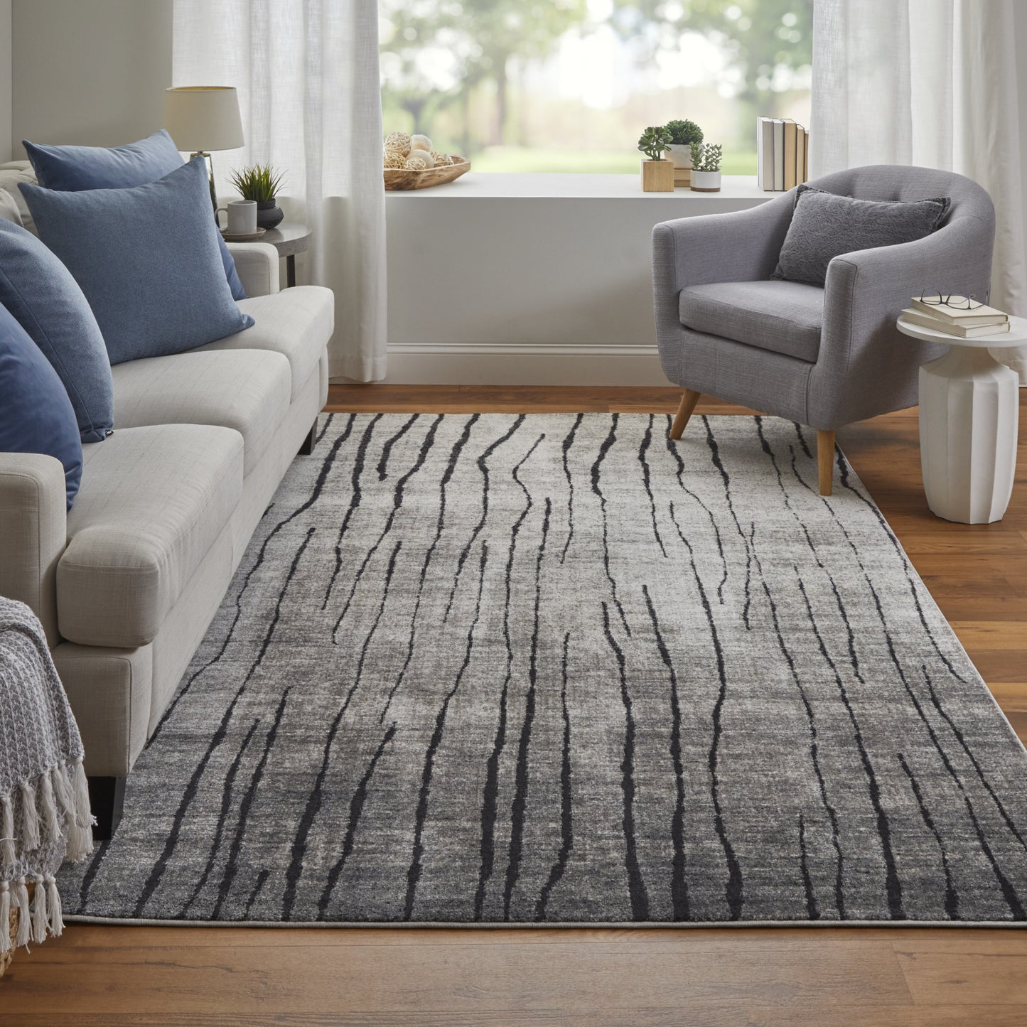 2' X 3' Black and Gray Abstract Power Loom Area Rug