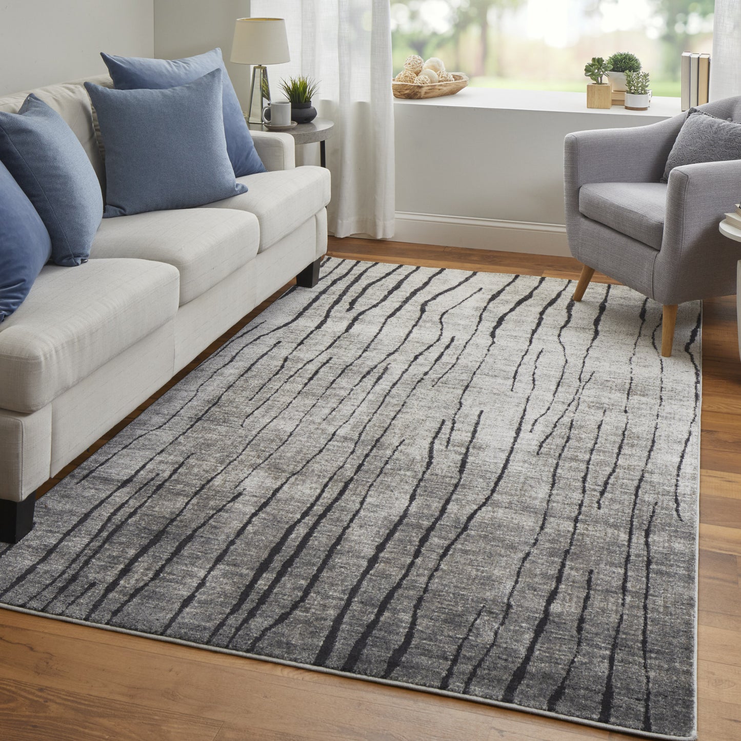 2' X 3' Black and Gray Abstract Power Loom Area Rug