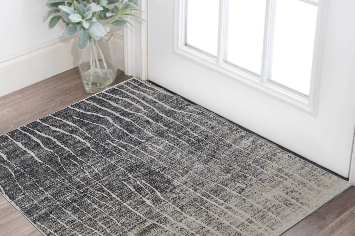 2' X 3' Black and Gray Abstract Power Loom Area Rug