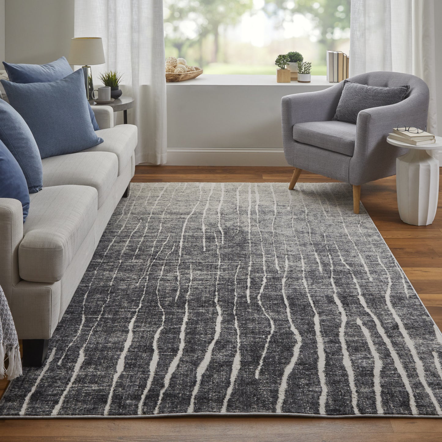 2' X 3' Black and Gray Abstract Power Loom Area Rug