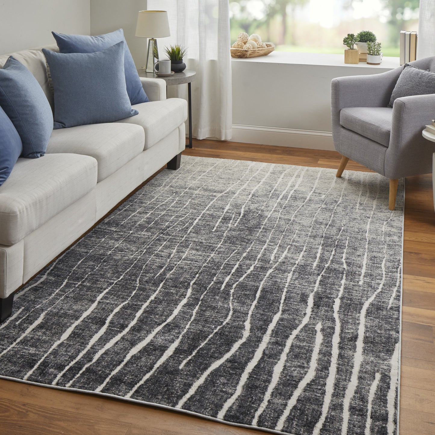 2' X 3' Black and Gray Abstract Power Loom Area Rug