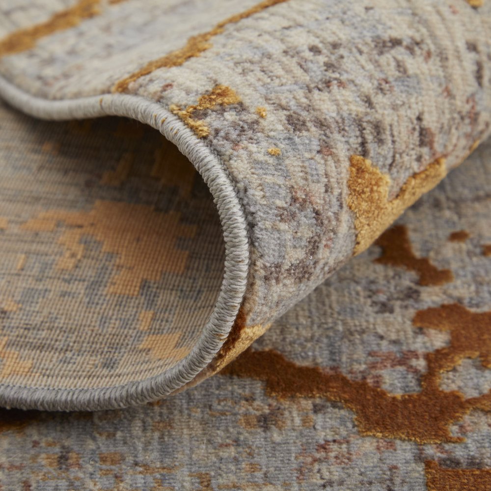 2' X 3' Taupe Green and Tan Abstract Power Loom Area Rug