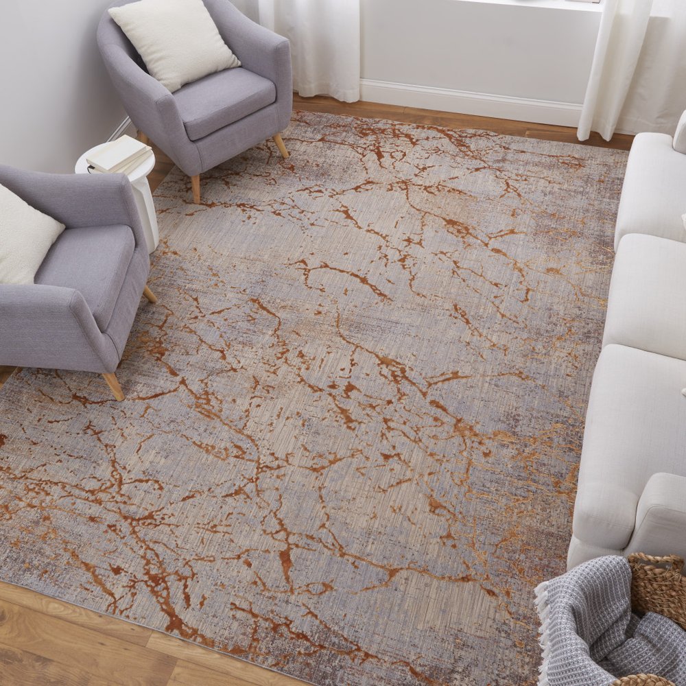 2' X 3' Taupe Green and Tan Abstract Power Loom Area Rug