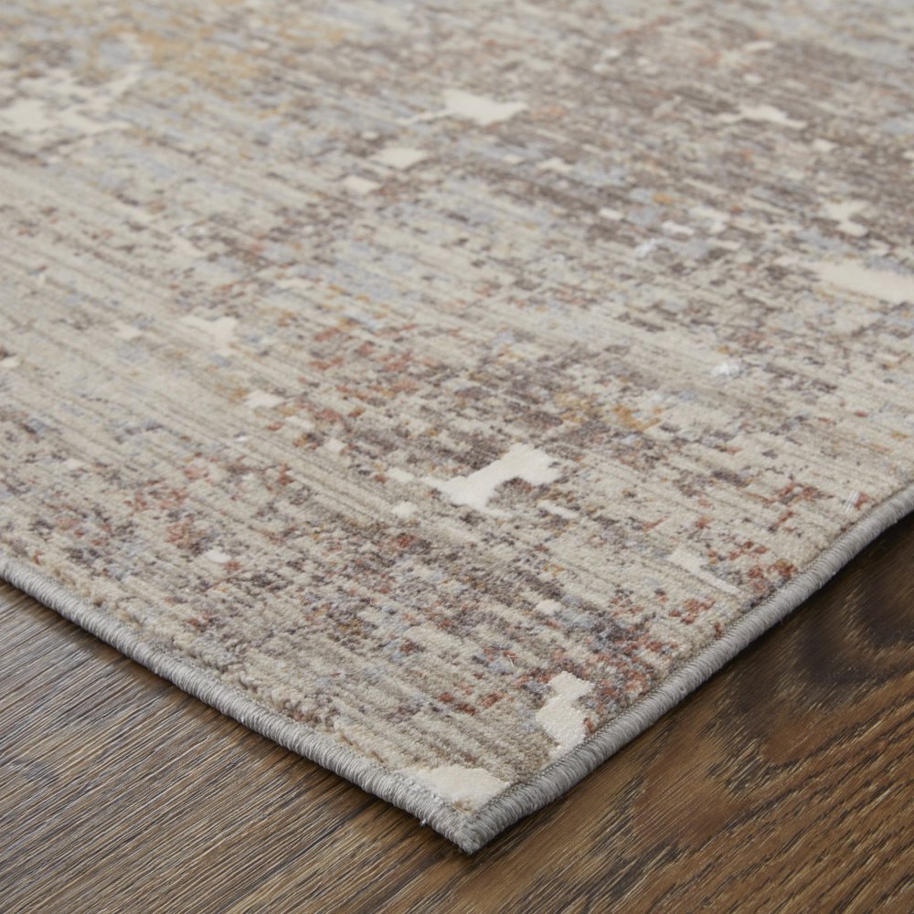 2' X 3' Taupe Brown and Ivory Abstract Power Loom Area Rug