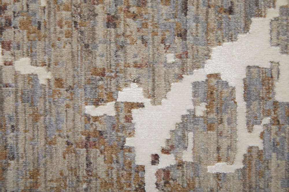 2' X 3' Taupe Brown and Ivory Abstract Power Loom Area Rug