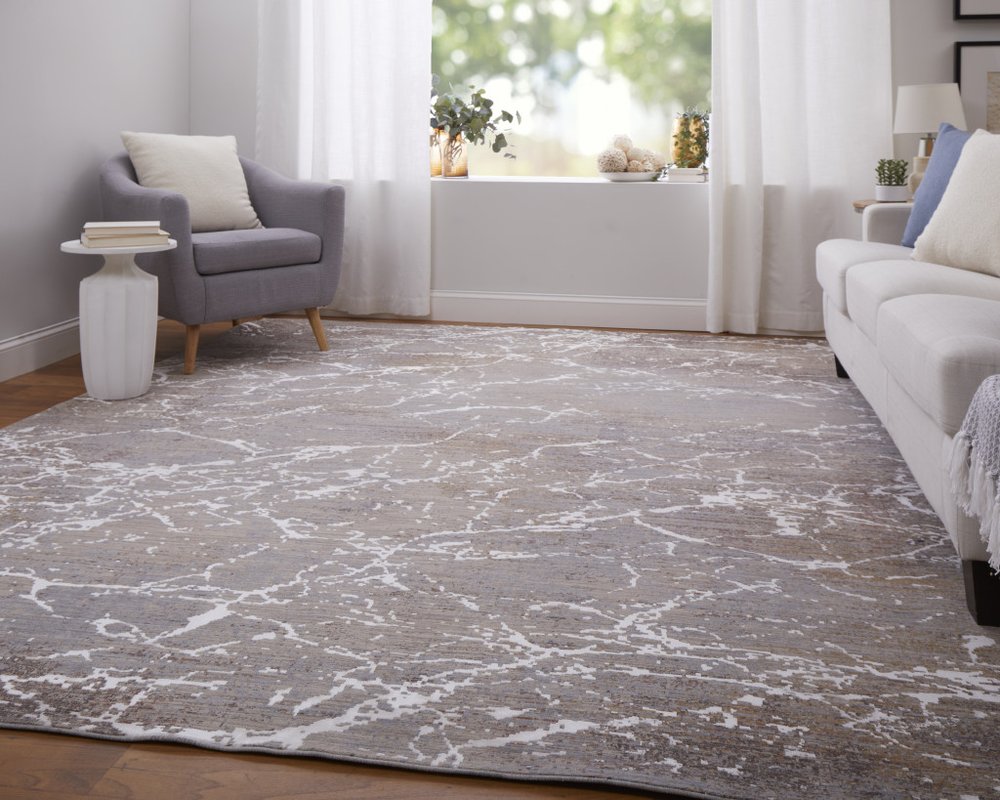 2' X 3' Taupe Brown and Ivory Abstract Power Loom Area Rug
