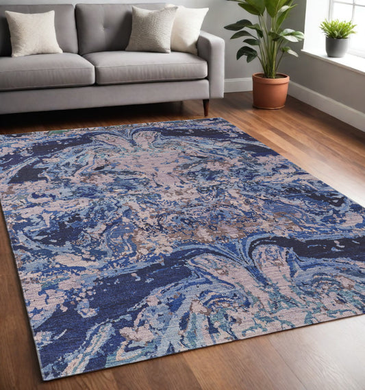 5' X 8' Blue Pink and Tan Abstract Power Loom Washable Area Rug