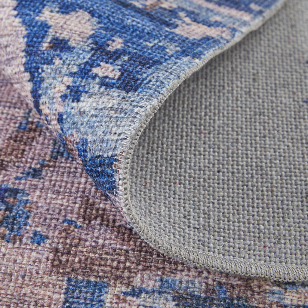 5' X 8' Blue Pink and Tan Abstract Power Loom Washable Area Rug